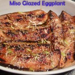 grilled slices of eggplant topped with miso paste and sesame seeds