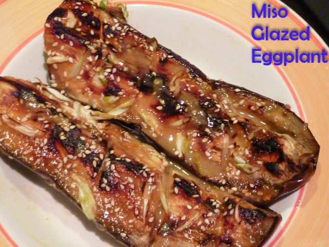 Miso Glazed Eggplant in a bowl with sesame seeds and spring onions