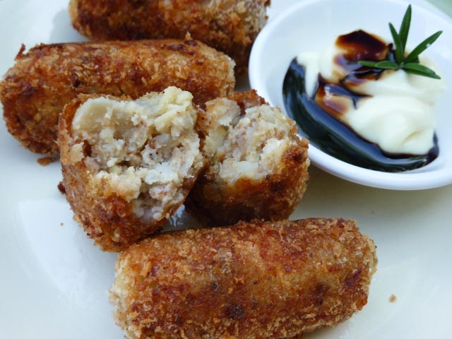 Smoky Aubergine Croquettes broken open with interior showing