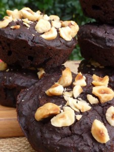 Black bean brownie muffins with roasted hazelnuts on top