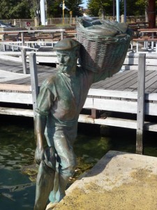 Bronze statue of sailor carrying basket of fish - Fremantle, WA