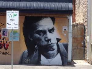 Street art - picture of musician Nic Cave spary painted onto a wall in Fremantle