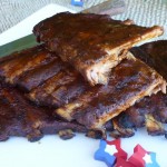 A plate piled high with smoky BBQ ribs