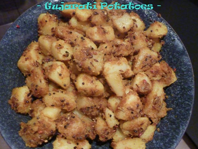 cubes of potatoes tossed in spices and coconut to make gujurati potatoes