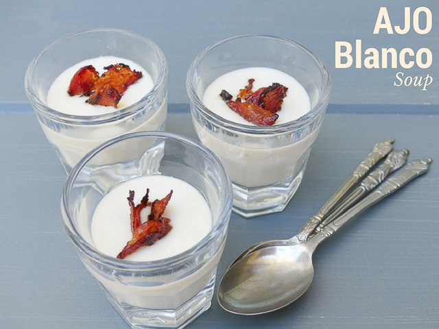 ajo blanco chilled spanish almond soup in cocktail shots with garnish