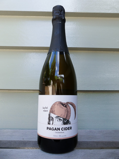 750ml glass bottle of pagan peach and apple cider