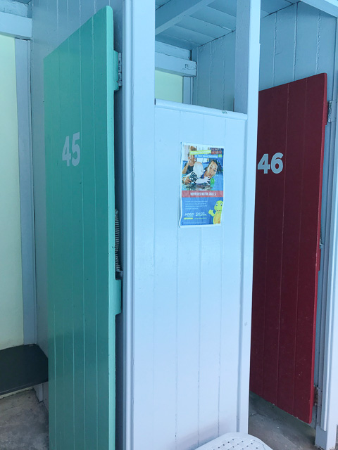 brightly coloured changing cubicle doors in the spring hill baths