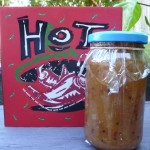 Jar of apple chutney with book that includes the recipe