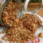 Jar tipped on side with granola cereal spilling out