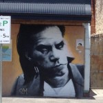 Street art - picture of musician Nic Cave spary painted onto a wall in Fremantle