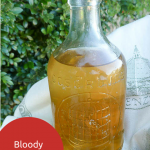 vintgae bottle containing marmamalde vodka made wth blood oranges